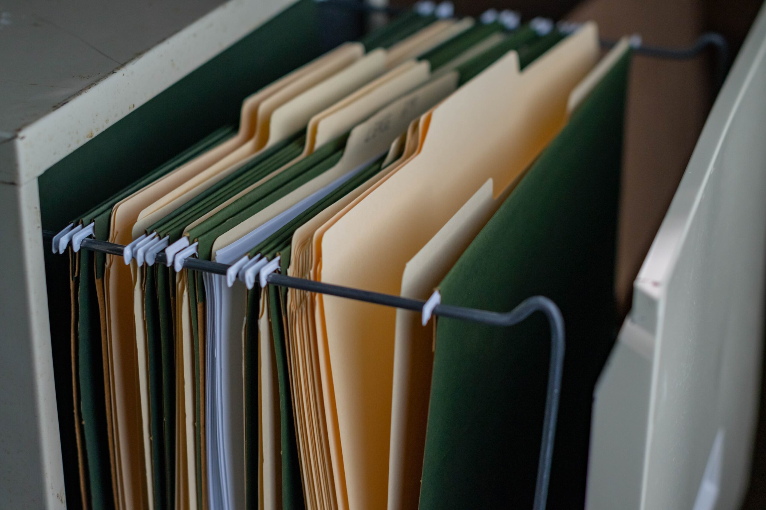 Selective,Focus,Filing,Cabinet,Looking,Three,The,Files,And,Folders,