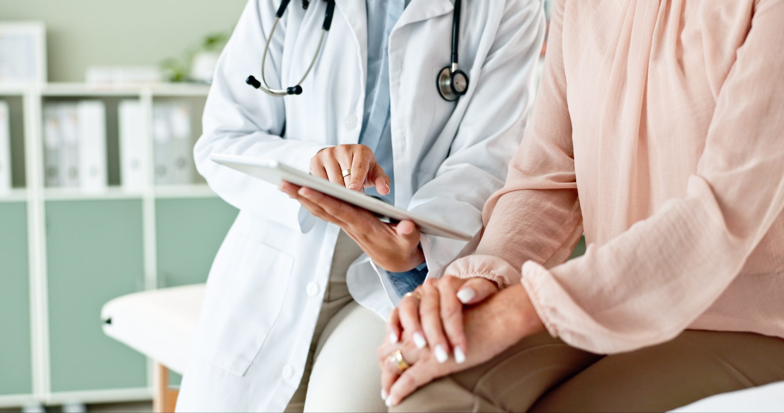 Clinic,,Tablet,And,Hands,Of,Doctor,With,Patient,For,Consulting,