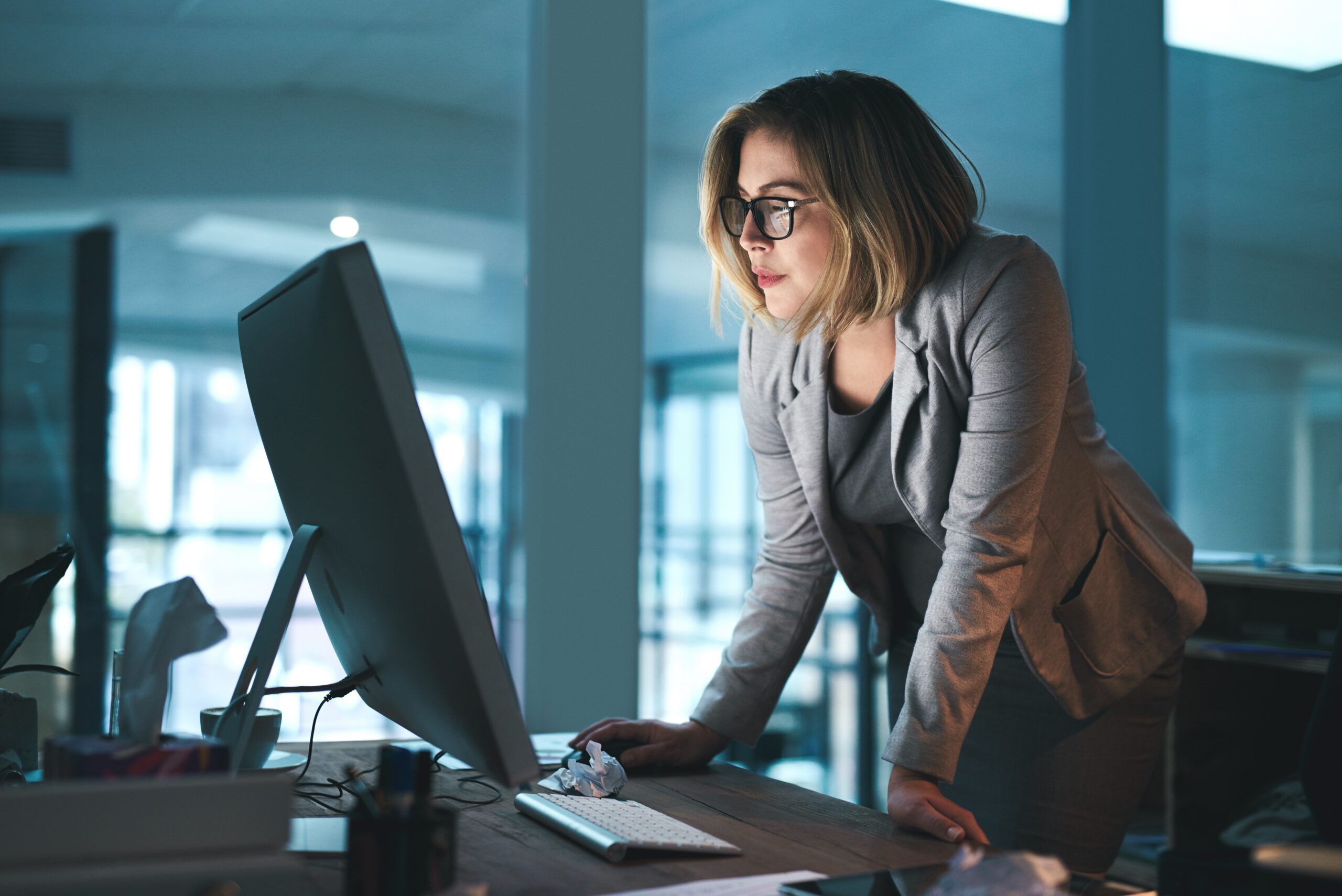 Woman,,Employee,And,Reading,On,Computer,In,Office,On,Browsing