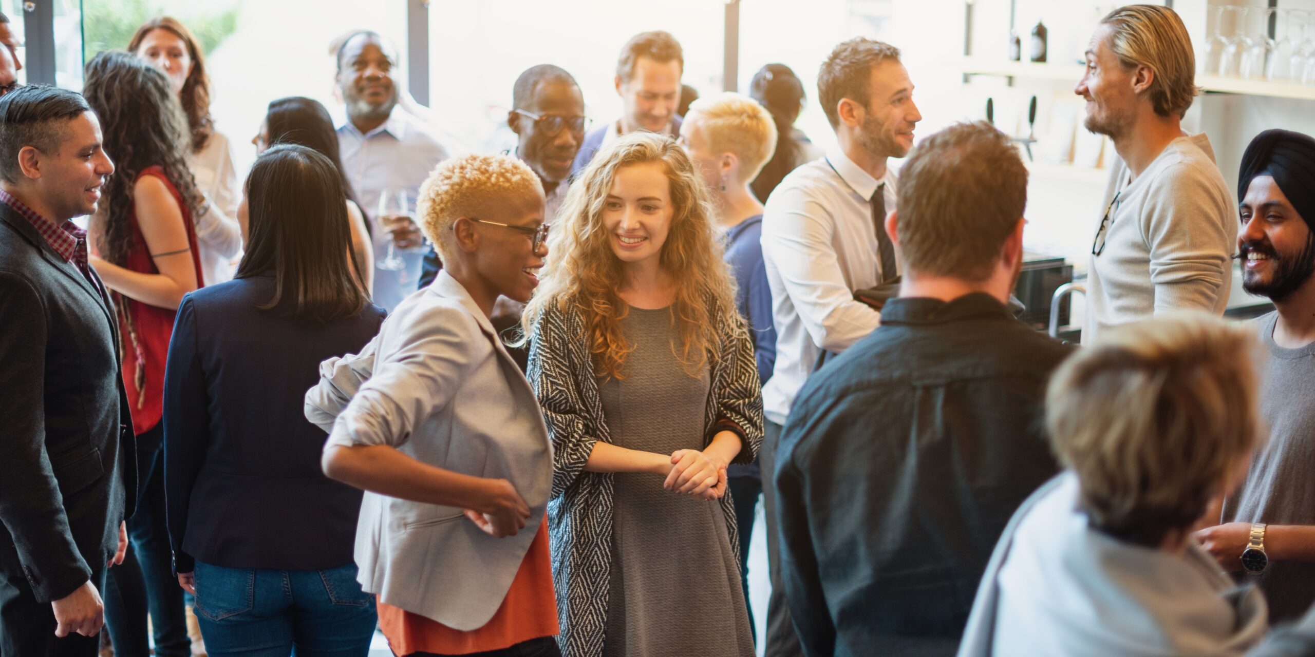 Diverse,Group,Of,People,Socializing,At,A,Casual,Gathering.,Men