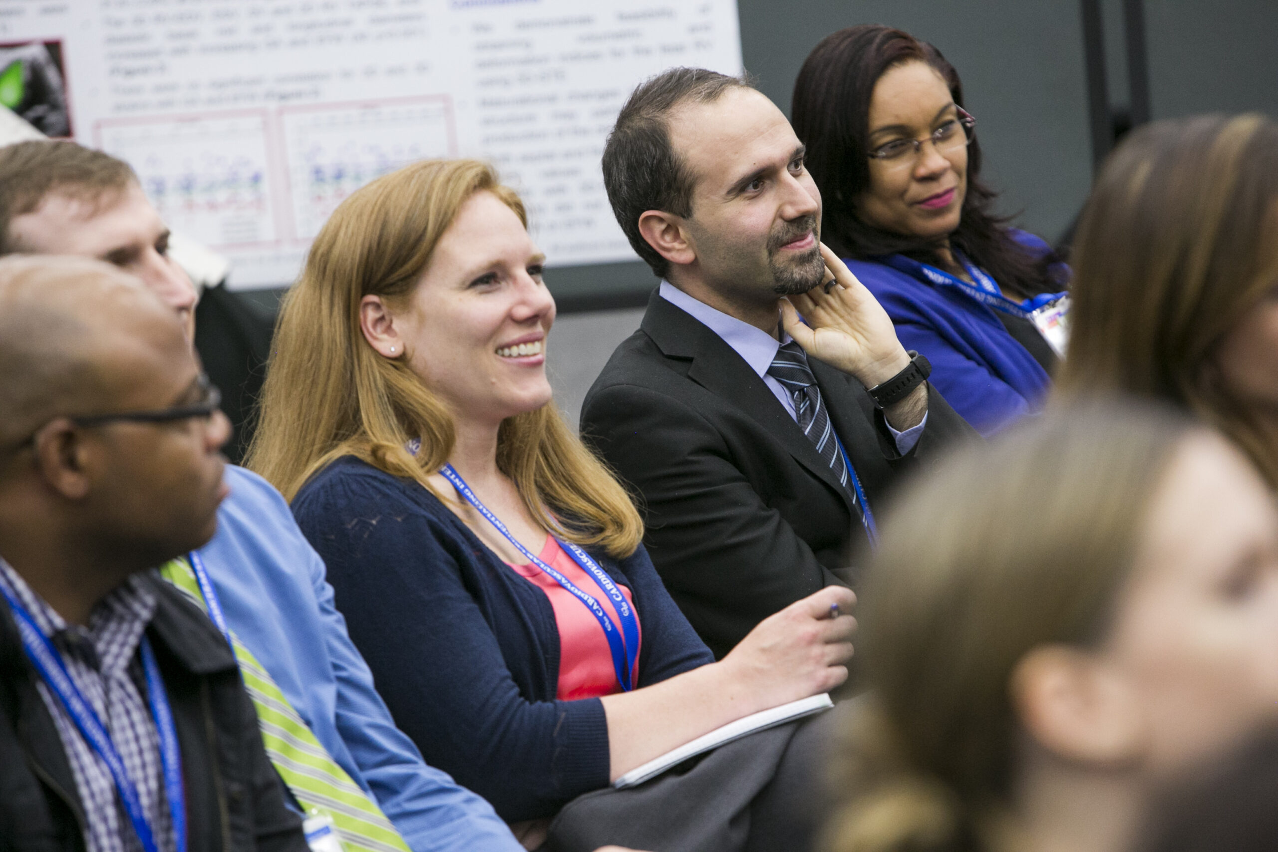 Woman Smiling Chalk Talk 2017 Smiling woman listening to a lecture at ASE 2017.